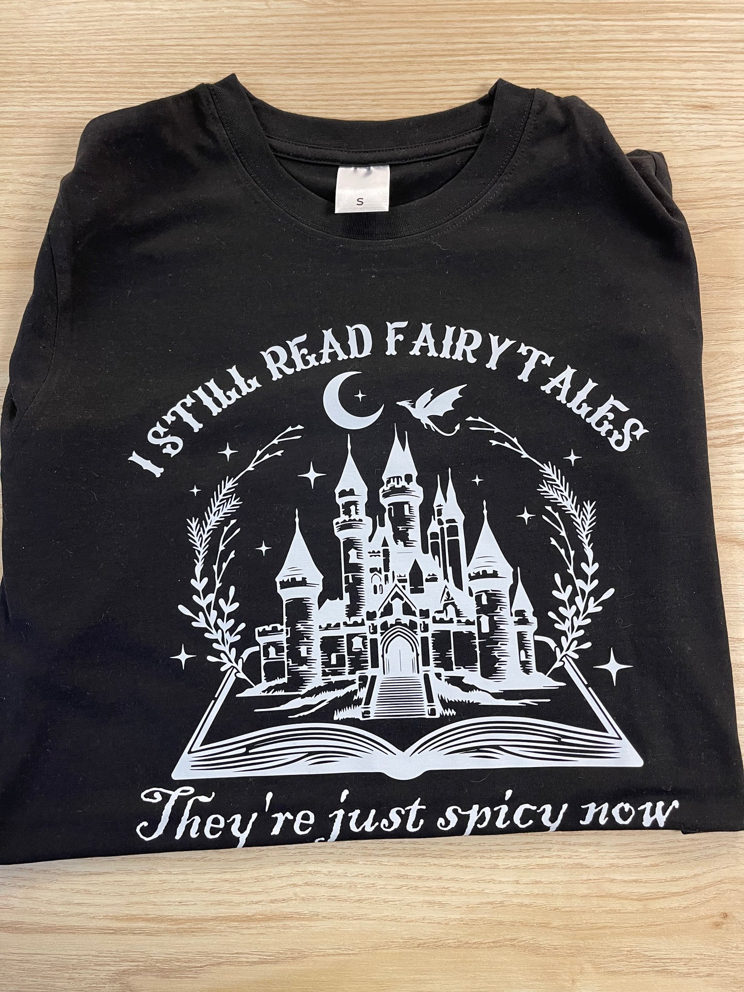 I Still Read Fairytales T-shirt- Black