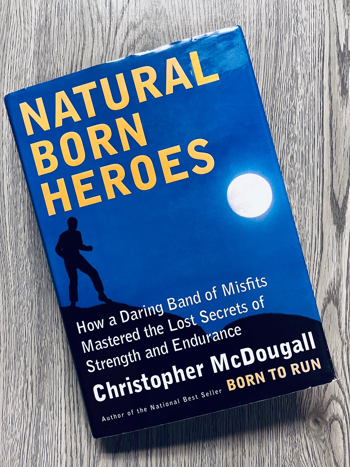Natural Born Heroes: How a Daring Band of Misfits Mastered the Lost Secrets of Strength and Endurance by Christopher McDougall - Hardcover Used