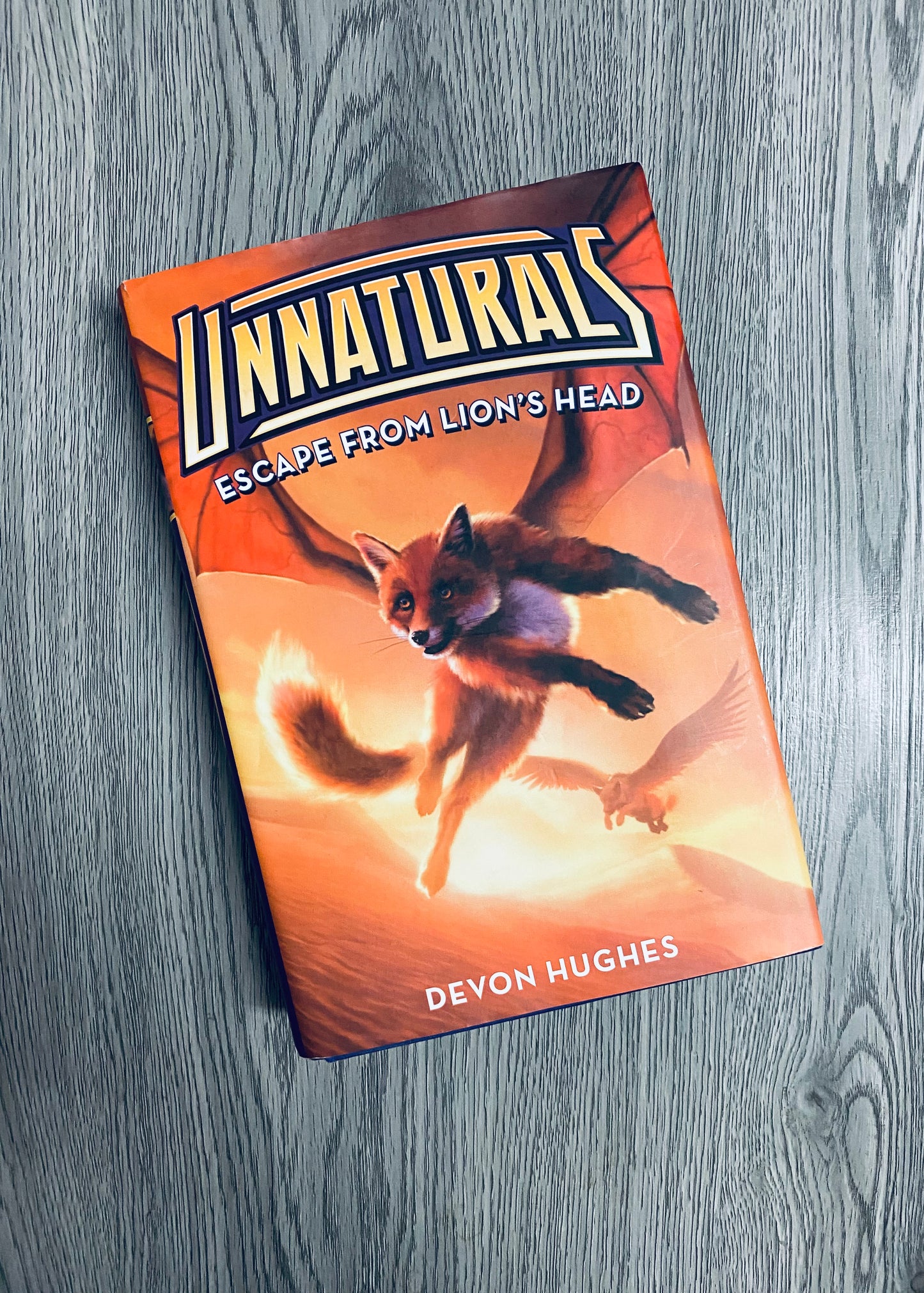 Escape from Lion's Head ( Unnaturals #2) by Devon Hughes-Hardcover Used