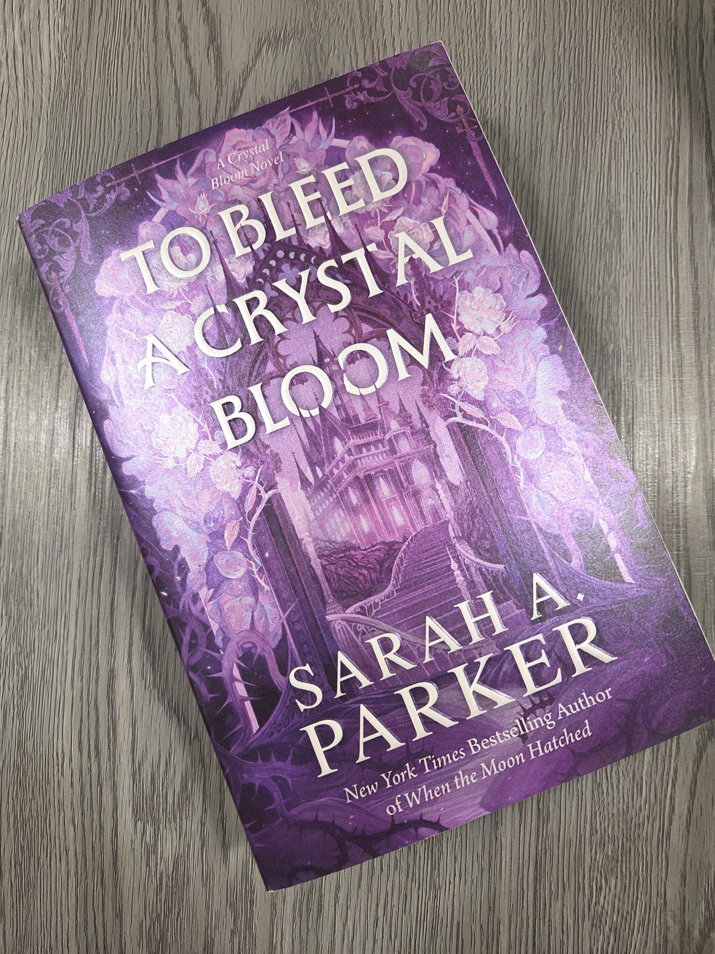 To Bleed a Crystal Bloom (Crystal Bloom #1 ) by Sarah A. Parker - Sprayed Edge Used