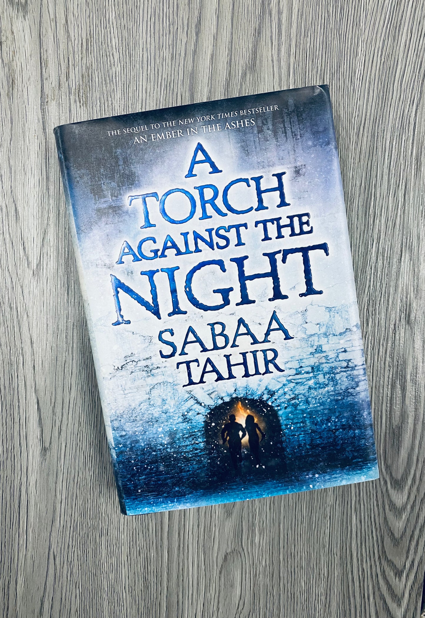 A Torch Against the Night (An Ember in the Ashes #2) by by Sabaa Tahir- Hardcover Used