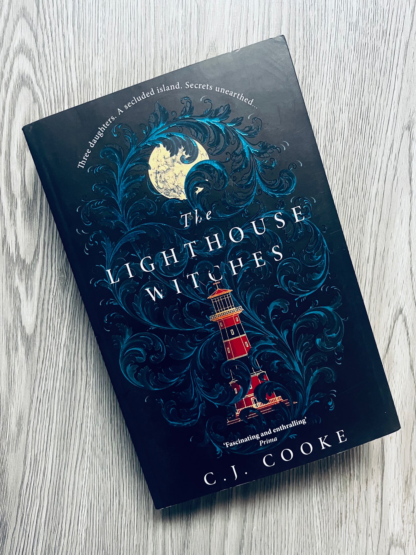 The Lighthouse Witches by C.J Cooke - Used