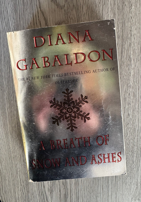 A Breath of Snow and Ashes (Outlander #6) by Diana Gabaldon- Used