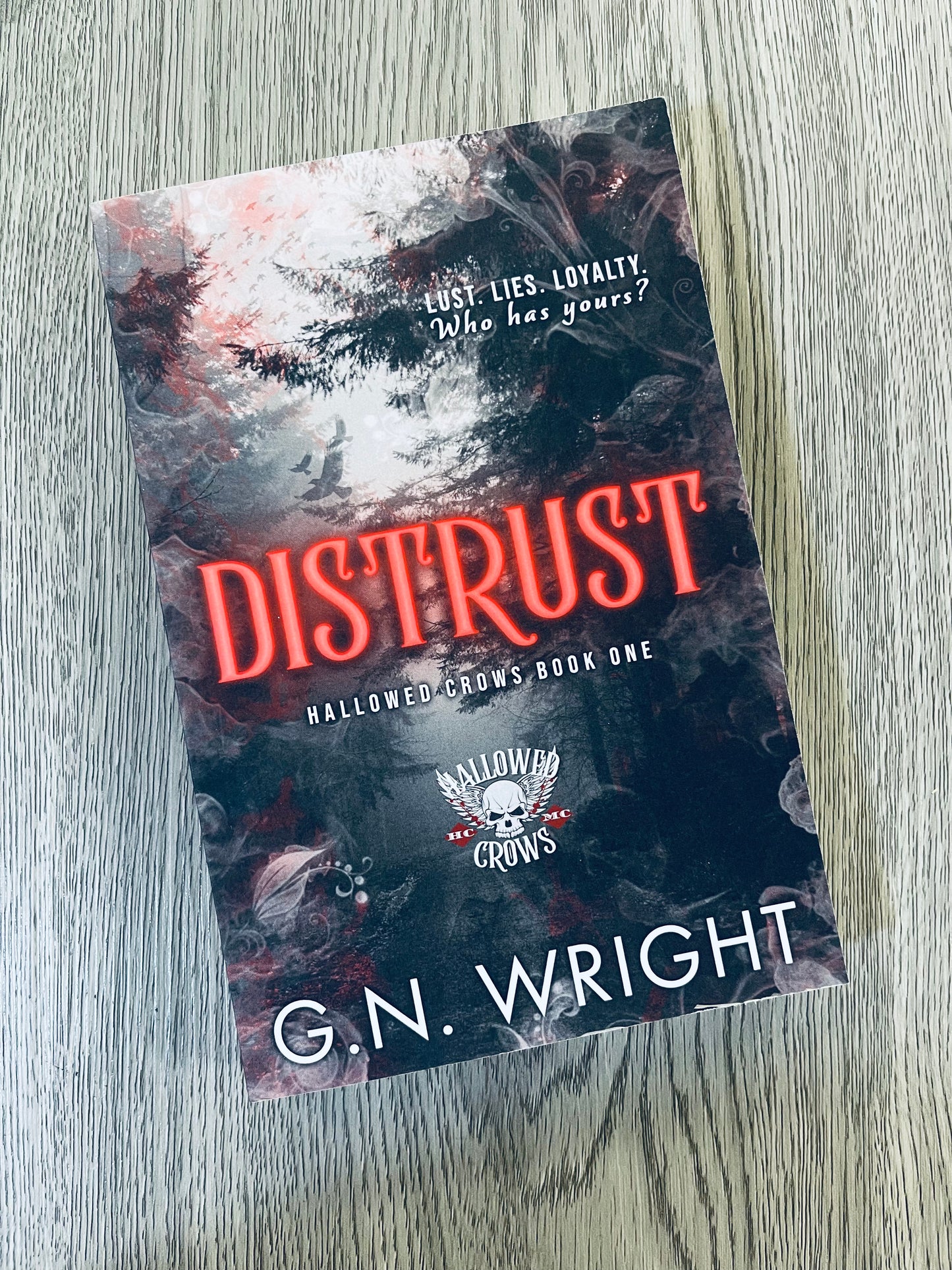 Distrust ( Hallowed Crows #1) by G.N Wright