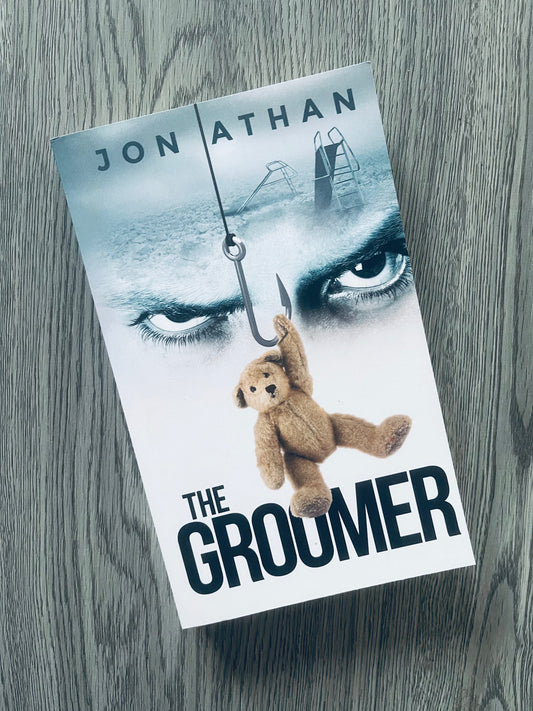 The Groomer by Jon Athan - Used
