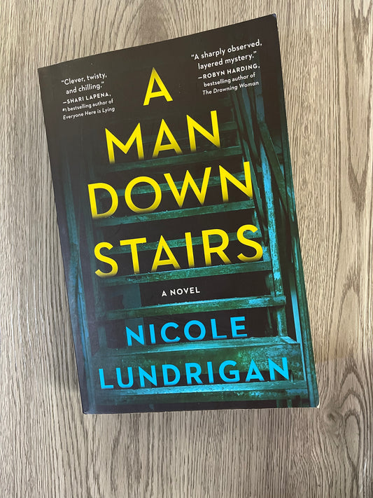 A Man Downstairs by Nicole Lundrigan