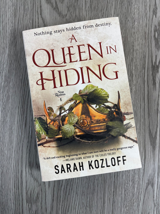 A Queen in Hiding ( The Nine Realms #1) by Sarah Kozloff