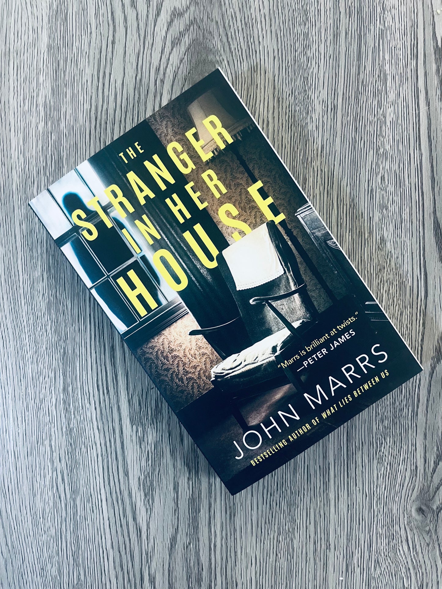 The Stranger in Her House by John Marrs