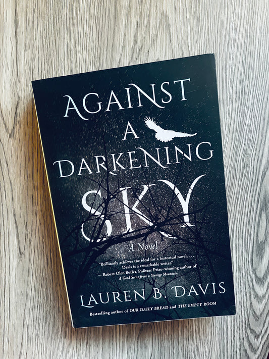 Against a Darkening Sky by Lauren B. Davis